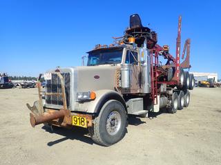 2003 Peterbilt 378 Tri-Drive Self Loading Log Truck c/w CAT C15 Diesel, 18-Spd Eaton Fuller, 72,440lb GVWR, 18,740lb Fronts, 17,900lb Rears, Vanguard 1028 Grapple Picker, (2) Outriggers, 18ft Tridem Log Pole Trailer, 260in WB And 11R24.5 Tires. CVIP 12/2024. Showing 133,722kms. VIN 1NPFXBEX53D592010 (LOCATED IN EDSON)