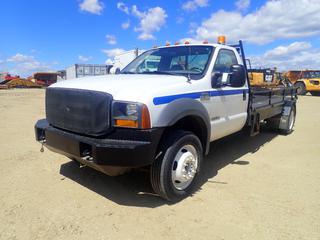 2005 Ford F550 XL Super Duty 4X2 Dually Flat Deck Truck  c/w 6.0L V8 Diesel, A/T, 14ft X 7ft Deck, Fold Down Sides, Pintle Hitch And 225/70R19.5 Tires. Showing 109,663kms. VIN 1FDAF56P95EC04631 (LOCATED IN ACHESON)