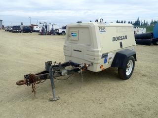 2013 Doosan S/A Compressor c/w John Deere 2.4L Diesel, Air Hose, Pintle Hitch And ST205/75D15 Tires. Showing 1705hrs. SN 440646UEWD75 (LOCATED IN ACHESON)