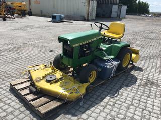 John Deere 140 Lawn Tractor c/w Kohler K321AS 512cc 14hp Engine, 48in Cutting Deck, 46in Rototiller Attachment, 16x6.50-8 Front Tires and 23x10.50-12 Rear Tires, S/N 060094M, *No Key, Running Condition Unknown* (HIGH RIVER YARD)