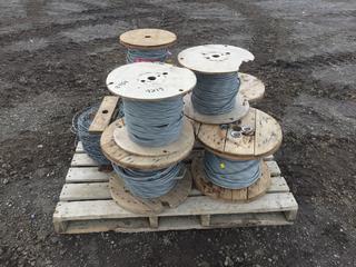 (1) Spool of Barbed Wire and (7) Spools of 3/8in Cable  (HIGH RIVER YARD)