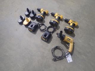 Qty Of (3) DeWalt DC970 18V 1/2in VSR Drill Drivers c/w DeWalt DW511 120V 1/2in VSR Drill, (7) 18V Batteries And (3) 18V Chargers