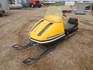 1971 Bombardier Olympique 335 Snowmobile c/w 335cc Rotax Gas Engine And 15in Track. SN 210213704 *Note: Turns Over, Do Not Start*