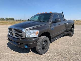 2009 Dodge Ram 3500 SLT 4x4 Dually Quad Cab Pick Up c/w 6.7 Cummins, 6 Speed, Headache Rack, Slip Tank, Soft Box Cover, Prodigy Brake Controller, 265/70R17 Tires, Showing 299,240 KMs, VIN 3D7MX48L19G542886  (HIGH RIVER YARD)