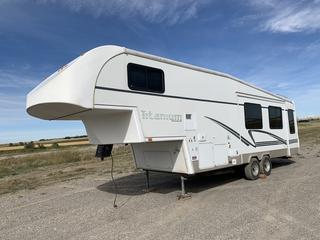 2002 Glendale Titanium 31E36MK 36ft T/A 5th Wheel Holiday Trailer c/w (2) Slides, Heat, AC, Solar Charger, Island, Gas Range, Microwave, Fridge/Freezer, Dining Table, Sofa, (2) Recliners, Stereo, Central Vac, Queen Size Bed, Shower, Sink, Separate Toilet Room, Pass Through Storage, Propane Tanks, 11,147lbs GVWR, Aluminum Rims, 235/80R16 Tires, VIN 2GRFW31T82S027831.  (HIGH RIVER YARD)