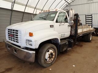 2000 GMC Top Kick C6500 4X2 Truck c/w CAT 3126 7.2L Diesel, 6-Spd Manual, 25,950lb GVWR, 8100lb Fronts, 17,850lb Rears, 200in X 8ft Deck, (2) 80in X 24in Ramps And 245/70R19.5 Rear Tires. Showing 461,884kms. VIN 1GDJ6H1C3YJ508118 *Note: Contents Not Included, Windshield Cracked, Seat Torn, Located Offsite For More Info Contact Shazeeda @ 780-721-4178* (12125 145st NW, Edmonton)