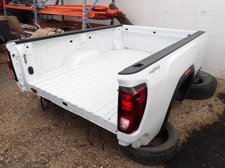 8ft X 78 1/2in X 42in GMC Truck Box To Fit GMC 2500 As Per Consignor *Note: Dents On Front, No Tailgate, Located Offsite For More Info Contact Shazeeda @ 780-721-4178* (12125 145st NW, Edmonton)