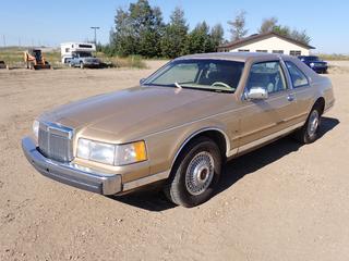 1984 Lincoln Mark VII 2-Door Coupe c/w Ford V8 Gas Engine, A/T, Sunroof And 215/70R15 Tires. Showing 125,982kms. VIN 1MRBP98F9EY626427 *Note: Driver Side Power Window Not Working* (FORT SASKATCHEWAN YARD) 