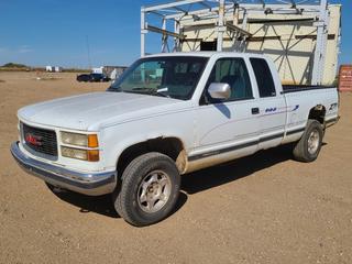 1994 GMC Sierra 1500 4X4 Extended Cab Pickup c/w V8 Engine, A/T And 255/70R16 Tires. Showing 276,939kms. VIN 2GTEK19K9R1575449 *Note: Parking Brake Lights On, Rust Throughout Body, Needs Brake Master Cylinder As Per Consignor, Brakes Don't Work, Dents* (FORT SASKATCHEWAN YARD) 