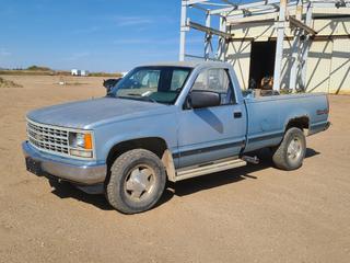 1989 Chevrolet 1500 4X4 Pickup c/w V8 Gas Engine, A/T And 265/70R16 Tires. Showing 430,934kms. VIN 2GCEK14H1K1120371 *Note: No Tailgate, Rust Throughout Body, Seat Torn, Rearview Mirror Not Attached* (FORT SASKATCHEWAN YARD)