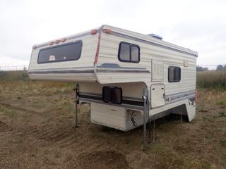 15ft Truck Camper To Fit 8ft Long Box Pickup Truck *Note: Water Damage On Roof And Interior, Buyer Responsible For Removal* *PL#7035* (FORT SASKATCHEWAN YARD)