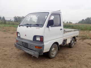 Mitsubshi Mini Cab 4WD Truck c/w Mitsubishi 3683 Gas Engine, 5-Spd Manual, 6ft Box And 155/80R12 Tires. Showing 47,301kms. VIN U42T-0322469 *Note: Turns Over, Do Not Start* (FORT SASKATCHEWAN YARD)