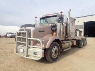 1998 Kenworth T800 T/A Sleeper Truck Tractor c/w Cummins 96N14 525hp Diesel, 18-Spd Eaton Fuller, 36in Sleeper, 58,860lb GVWR, 12,860lb Fronts, 23,000lb Rears, 232in WB And 11R24.5 Tires. CVIP 05/2025. Showing 1314hrs, 271,363kms. VIN 1XKDD20X2WR951792