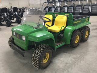 John Deere Gator Side-By-Side Utility Vehicle, 6x4 c/w 22.5x10.0-8 Front Tires, AT25X13-9 Rear Tires, Showing 302Hrs, PIN W006X4X041558  (HIGH RIVER YARD)