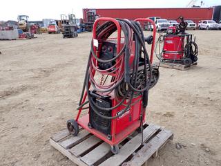 Lincoln Electric Flextec 450 380/460/575V 3-Phase Multi-Process Welder. SN U1130109103 c/w Cable, Cart And Lincoln Electric LF-72 24-42V Single Phase Wire Feeder. SN U1130808602 **THIS ITEM IS LOCATED @ 5107 67 ST, LLOYDMINSTER, AB FOR MORE INFO CONTACT JASON  @780-870-0193**