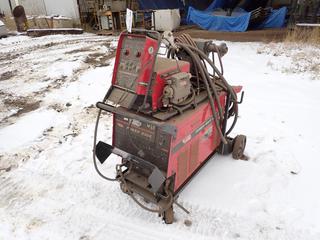 Lincoln Electric Power Wave 455/STT Advanced Process Welder. SN U1040622693 c/w Lincoln Electric Power Feed Wire Feeder. SN U1030600098 **THIS ITEM IS LOCATED @ 5107 67 ST, LLOYDMINSTER, AB FOR MORE INFO CONTACT JASON  @780-870-0193**