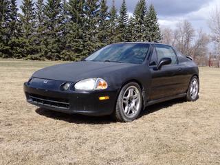 1993 Honda Del Sol 2-Door Coupe c/w 1.6L, 5-Spd Manual, Lowered Suspension, After Market Exhaust And 205/50R16 Tires. Showing 316,356kms. VIN JHMEH616XPS800581 **Located In Edmonton**
