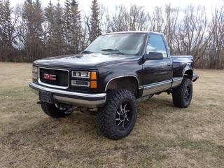 1997 GMC Sierra 1500 G71 SLE 4X4 Regular Cab Pickup c/w 5.7L. V8, A/T And LT295/70R18 Tires. Showing 393,936kms. VIN 1GTEK14R2VZ501909 *Note: Windshield Cracked* **Located In Edmonton**