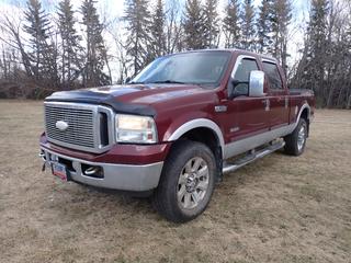 2007 Ford F350 Super Duty Lariat 4X4 Crew Cab Pickup c/w 6.0L Power Stroke V8 Turbo Diesel, A/T, Leather Seats, Tonneau Cover, DVD Player And LT275/65R20 Tires. Showing 294,907kms. VIN 1FTWW31P76EC84020 *Note: Windshield Cracked*   **Located In Edmonton**