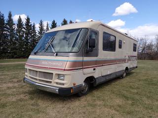 1990 Fleetwood Southwind Model E GM Motorhome c/w 6649kg GVWR, 110/125V, 30 Amp, (1) Bedroom, (1) Bathroom And BR19.5 12-Ply Tires. Showing 91,512kms. VIN 1GDKP37N8L3501806 *Note: Windshield Cracked, Ceiling Damaged* **Located In Edmonton**