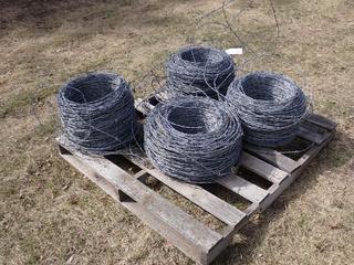 Qty Of (4) Rolls Of Barbed Wire *Note: Lengths Unknown* **Located In Edmonton**