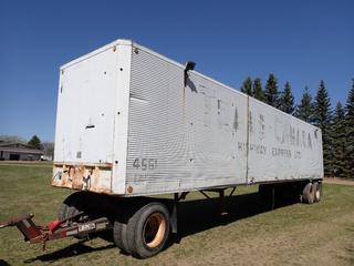Fruehauf VAXF245 45ft T/A Van Trailer w/ Contents And 10.00-22 Tires. SN DXF327005 *Note: Buyer Responsible For Removal, Brakes Released, Not Road Worthy, Dolly Not Included* **Located In Edmonton**