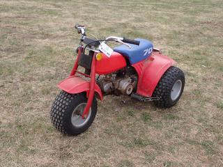 1985 Honda ATC70 Trike c/w Honda 72cc Gas, 4-Spd And 16X8-7 Tires. VIN JH3TB0307FC000140 *Note: Runs Per Owner* **Located In Edmonton**