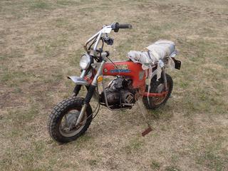 1976 Honda GT70 Trail Bike w/ 4.00-10 Tires. Showing 3153 Miles. VIN CT70-2503503 *Note: Running Condition Unknown* **Located In Edmonton**
