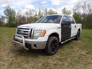 2009 Ford F150 XLT 4X4 Crew Cab Pickup c/w 5.4L Triton, A/T And LT265/70R17 Tires. Showing 300,689kms. VIN 1FTPW14V09KC87866 *Note: Check Engine And Low Tire Pressure Light On, Rust Throughout, Back Bumper Dented* **Located In Edmonton**