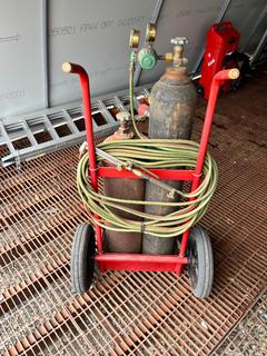Oxy Acetylene Cutting Torch Kit and Cart C/w Regulators, Hose, Handle, Tanks **Located At Turner Valley, AB, For More Information Contact Tony @780-935-2619**