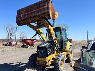 Caterpillar 414E IL Rubber Tire 4x4 Loader C/W 12.5/80-18NHS Tires. PIN CAT0414EVELB00810 **LOCATED AT ESTEVAN COAL MINE, SK, For More Information Contact Tony @780-935-2619** *NOTE Rear Cable Ring Attachment Not Included, Requires Repairs*
