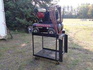 36in X 29in X 38in Portable Steel Cart c/w Honda PPTGX160 Gas Powered Air Compressor And Air Hose. SN 02042014014 **Located In Edmonton**