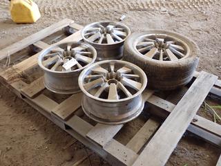(1) 275/40ZR18 Tire w/ Rim c/w (3) 18in Rims **This Item Is Located @ 23453 Township Rd 502, Rolly View AB, For More Info Contact Tony @780-935-2619, Viewing And Removal By Appointment Only**