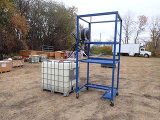 4ft X 41in X 8ft Portable Metal Frame Tote Stand c/w Storage Shelves, DEF/Fuel Transfer Pump, Reel, Hose, Piusi 120V Motor, Schutz 1000L Liquid Storage Tank And Qty Of DEF Fluid **Located In Edmonton**