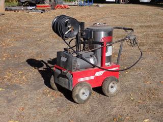 Hotsy Model 795SS 2000PSI 230V Single Phase Pressure Washer c/w Hose Reel, Hose And Wall. SN 11090390-164663 **Located In Edmonton** PL#2793