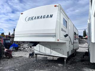 2001 Okanagan 27ft Travel Trailer c/w Bathroom, Bedroom, Couch, Fridge, Stove, Microwave, Awning And LT235/85R16 Tires. VIN 2T9T5T29411018092 **This Item Is Located In Hinton AB, For More Info Contact Tony @780-935-2619**