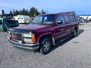 1992 GMC Sierra 4X2 Pickup c/w 5.7L, A/T And Box Cover. Showing 418,831kms. VIN 2GTEC19KXN1538577 *Note: Tear In Seat, Rust* *This Item Is Located In Hinton AB, For More Info Contact Tony @780-935-2619**