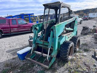 John Deere 170 Skid Steer C/w Additional Parts, (2) Bkts, Wisconsin Engine, SN 000567 *NOTE Requires Repairs* **This Item Is Located In Hinton AB, For More Info Contact Tony @780-935-2619**