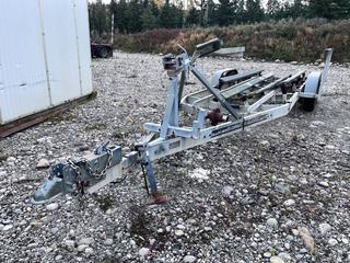 Pacific Trailers T/A Boat Trailer C/w Bunks, Winch, Surge Brakes, VIN 40R1KG228LAK02671 **This Item Is Located In Hinton AB, For More Info Contact Tony @780-935-2619**
