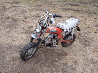 1976 Honda Trail 70 Minibike. Showing 3153 Miles. VIN CT70-2503503 *Note: Missing Parts, Running Condition Unknown* **Located In Edmonton**