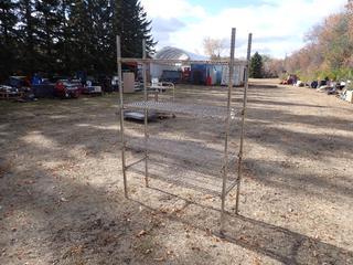 Cart All 48in X 18in X 72in 4-Tier Shelving Unit *Note: (1) Leg Bent* **Located In Edmonton**