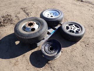 (1) Atlas MK-11-G78-15 Tire w/ 5-Bolt Rim, (1) Cavalier SRX P213/60R14 Tire w/ 5-Bolt Rim, (1) Uniroyal LT235/85R16 Tire w/ 6-Bolt Rim And (1) 5-Bolt Rim