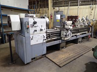 2005 Fabryka Automatow Tokarskich TUR630A 3-Phase CNC Conventional Lathe w/ 12ft Table, Bisin 19 1/2in 4-Jaw Chuck, Bison 15 3/4in 3-Jaw Chuck, 7in, 10in And 12in Steady Rest And Mitutoyo KA-12 Controller. SN 050023 *Note: Buyer Responsible For Power Disconnect And Removal* **For Your Convenience Quote Available From Rusty's Equipment For Power Disconnect, Fluids Drained, Rigging(If Required) And Loaded On Your Transport for a Cost $1,050**