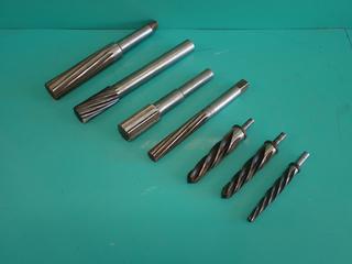 Qty Of 1 1/2in And 1in Reamer Bits c/w Assorted Taper Shank Core Bits **Located In Edmonton**