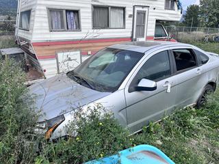 2011 Ford Focus SES Sedan C/w 4 cyl, A/T Unable to Verify Mileage *Battery Dead, Broken Rear Window* VIN 1FAHP3GN3BW108894 *Previously Registered In Manitoba *Located In Fernie, BC*