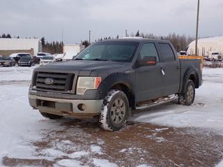 2009 Ford F150 XLT 4X4 Crew Cab Pickup c/w 5.4L V8 Triton, A/T And LT265/70R18 Tires. Showing 329,875kms. VIN 1FTPW14V59FB30021 *Note: Rust Spots, Engine Light On* **Located In Fort McMurray**