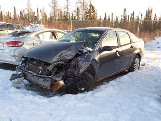 2006 Ford Focus SE ZX4 4-Door Sedan c/w A/T And 195/60R15 Tires. VIN 1FAFP34N06W167032 *Note: Parts Only, Running Condition Unknown, Buyer Responsible For Removal* **Located In Fort McMurray**