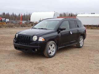 2007 Jeep Compass 4X4 SUV c/w 2.4L, 4-Cyl And P215/60R17 Tires. Showing 219,081kms. VIN 1J8FF47W27D316344 *Note: Engine Light On, Front Bumper Damaged, Passenger Side Light Damaged, Fender Dented And Windshield Cracked* **Located In Fort McMurray**