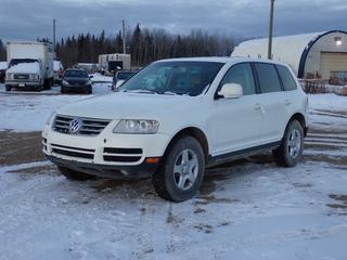 2005 Volkswagen Touareg AWD SUV c/w 3.2L, A/T, Power Sunroof And 255/70R17 Tires. Showing 276,474kms. VIN WVGZG77L45D038502 *Note: Paint Chips, Scratches* **Located In Fort McMurray**