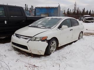 2007 Honda Civic 4-Door Sedan c/w 1.8L, A/T, Power Sunroof And 205/55R16 Tires. VIN 2HGFA16897H018062 *Note: No Key, No Battery, Unable To Verify Mileage, Front Bumper Damaged, Rust Spots, Dents, Running Condition Unknown, Buyer Responsible For Removal* **Located In Fort McMurray**